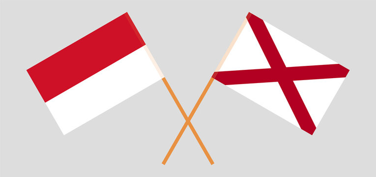 Crossed flags of Indonesia and The State of Alabama. Official colors. Correct proportion