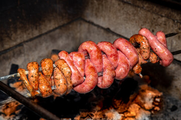 The most traditional Brazilian barbecue, sausage roasted on a skewer over the grill