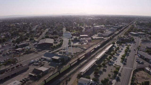 Manteca, California, USA - July 15, 2021: Afternoon sun shines on the city's famous water tower.