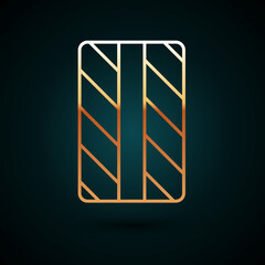 Gold line Car tire wheel icon isolated on dark blue background. Vector