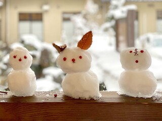 Cute modeling of two snowmen and a rabbit snowman /...