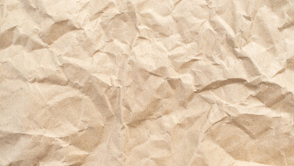 Recycled brown creased paper background from a paper box for packing. Paper pattern abstract background concept.
