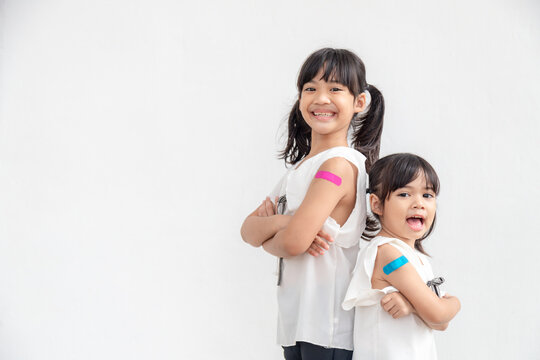 Asian Little Girl  Feel Good After Received A Vaccine.