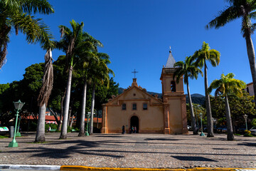 Fototapeta na wymiar Facade of the parish church of Sao Sebastiao, Built in the 17th century of stone and lime, during the Jesuits' era, 