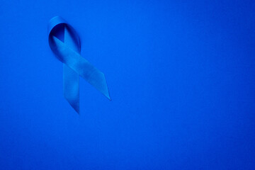 Blue prostate ribbon. Awareness of men health in November with blue prostate cancer ribbon isolated...