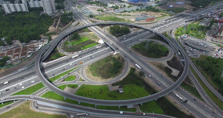 Aerial view of transport interchanges with roundabout traffic