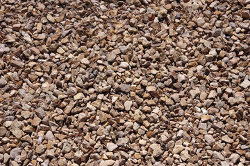 Full frame close-up view of an area of rough sandstone gravel