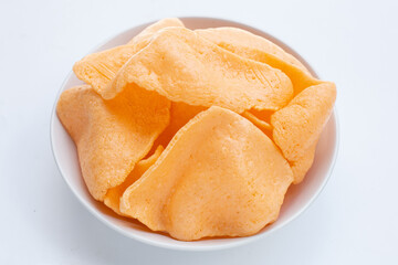Prawn crackers on white background. Shrimp crispy rice snack