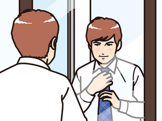 鏡の前でネクタイを締める男性