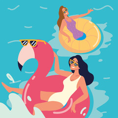 relaxed women in inflatable rings