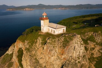 Fototapeta na wymiar Lighthouse Baluzek on the coast of the Sea of Japan