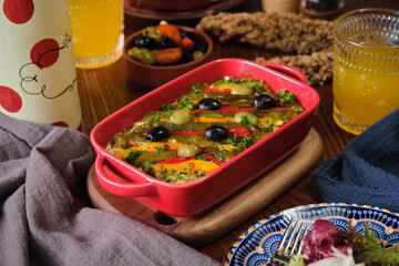 Beautiful and tasty Russian salad on the table of Spanish restaurant