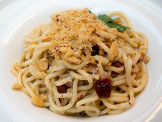 Bigoli Pasta Con Sarde di Lago, Pomodori Secchi e Briciole, Spaghetti Noodles with Sardines from Lake Garda, Sun Dried Tomatoes and Breadcrumbs