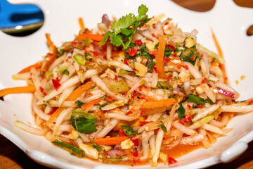 A delicious Thai hot and sour green papaya salad
