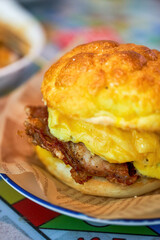 Fried egg pork chop with pineapple buns in a Hong Kong tea restaurant