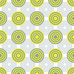 Decorative abstract circles. Seamless pattern for fashion prints on fabric, pillows, wrapping paper. The trend colors of 2021 are yellow and gray. Vector.