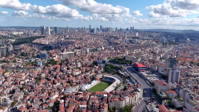 Istanbul cityscape aerial video of Recep Tayyip Erdogan Stadium Arena in Kasimpasa ft. city center around Taksim neighborhood of Beyoglu district with skyscrapers in the background in Turkey 4K
