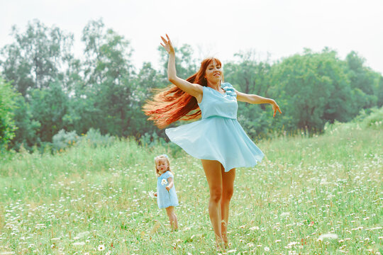 Mom Dancing With Her Daughter