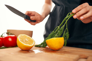 lemon on a cutting board slicing vegetables vitamins healthy food