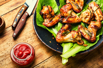 Fried chicken wings in teriyaki sauce