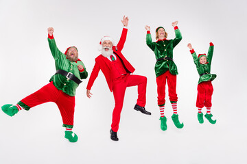 Full length body size view of attractive cheery four people jumping having fun eve time isolated...