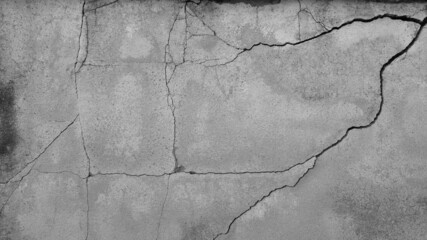 Naklejka premium The old cement wall was weathered, the surface was scratched, the surface was scratched and damaged. For a mysterious retro-conservative background.