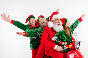 Portrait of cheerful friends riding motor bike having fun good mood december isolated over white color background