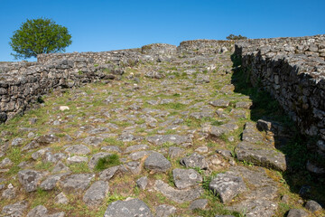 Fototapeta na wymiar Archaeological park of the castrexa culture, site of San Cibrán de Lás. Ruins of the city known in Roman times as Lansbrica. Ourense, Galicia, Spain.
