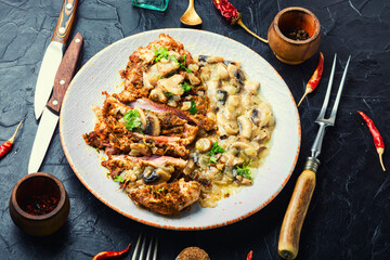 Grilled turkey steak with fried mushrooms