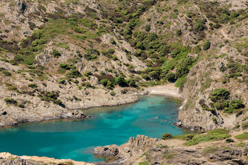 Fototapeta na wymiar emerald colored bay in cap de creus on the costa brava in the province of girona a sunny summer day