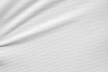 Fototapeta na wymiar White sports clothing fabric football shirt jersey texture background