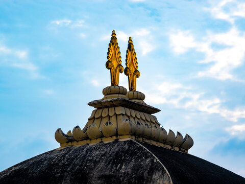 Square shaped dome with golden color decoration