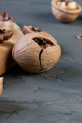  a split walnut on a brown concrete or slate background. healthy nut food for the brain. The concept of the background of fresh walnuts. top view. A natural product.