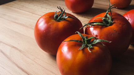 Organic tomatoes on wooden table from Anatolian region, Turkey