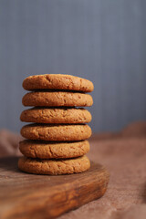 Stack of cookies on wooden board