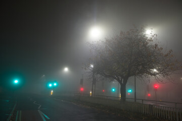 Junction of Clarkehouse road, b6069, to Glossop road, b6547, at night with fog.