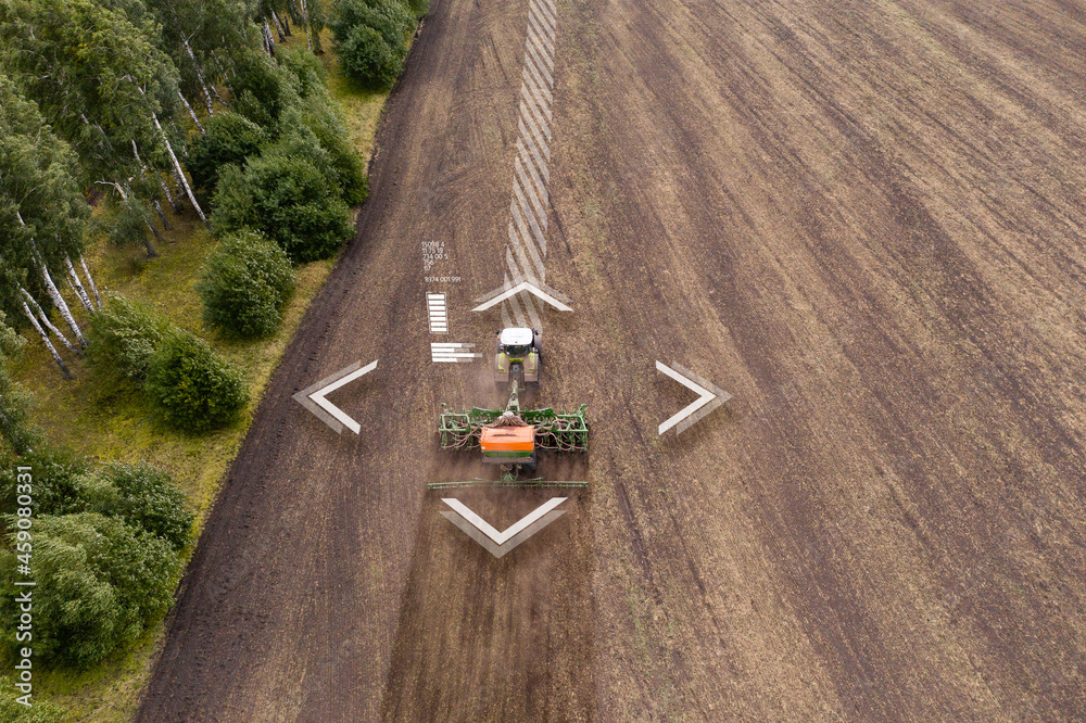 Poster autonomous tractor on the field. digital transformation in agriculture