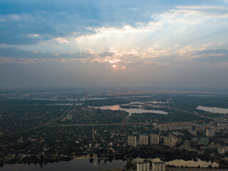 Sunset over Kiev. Cloudy evening. Aerial drone view.