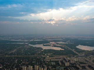 Sunset over Kiev. Cloudy evening. Aerial drone view.