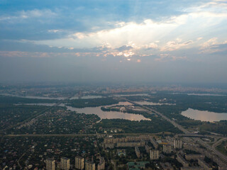 Sunset over Kiev. Cloudy evening. Aerial drone view.