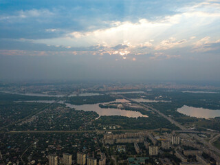 Sunset over Kiev. Cloudy evening. Aerial drone view.