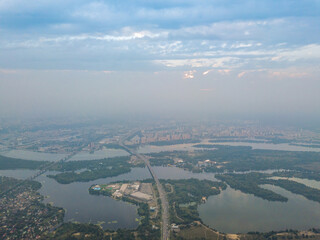 Sunset over Kiev. Cloudy evening. Aerial drone view.