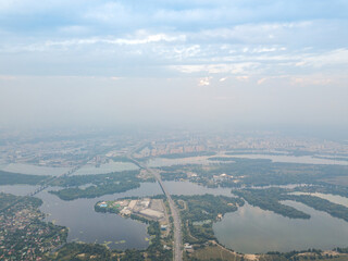 Sunset over Kiev. Cloudy evening. Aerial drone view.
