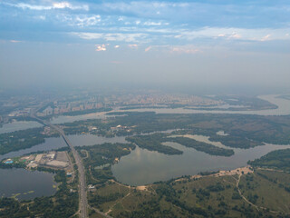 Sunset over Kiev. Cloudy evening. Aerial drone view.