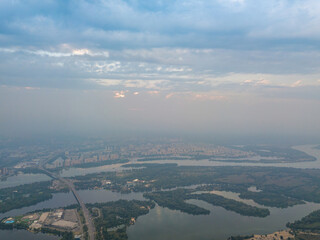 Sunset over Kiev. Cloudy evening. Aerial drone view.