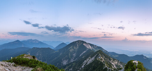 View from the peak of the Herzogstand in Bavaria Germany with a colorful sunset