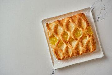 puff pastry mini pie with with pear and lime jam
