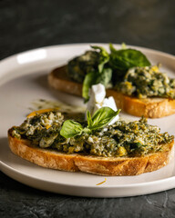 scramble on toast with pesto sauce