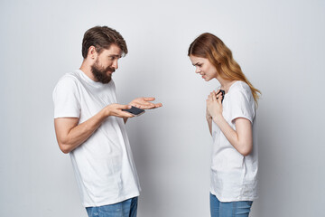 man and woman quarrel jealousy telephones communication isolated background