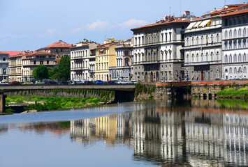 First building from right - St. Regis Florence - 5 star hotel, facades along Arno river in historic part of Florence, in front Amerigo Vespuci bridge, Florence, Italy, Europe